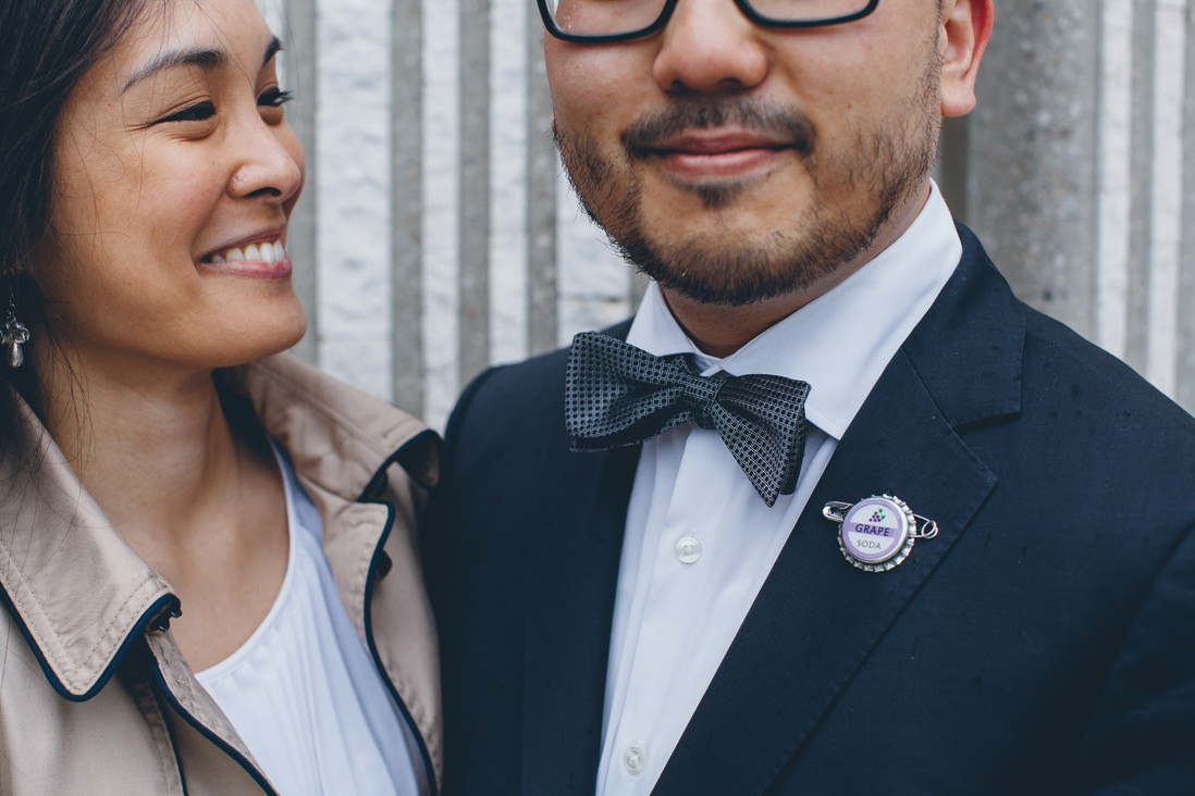Close up of Groom's Grape Soda Button from UP movie | Toronto City Hall Wedding | EIGHTYFIFTH STREET PHOTOGRAPHY